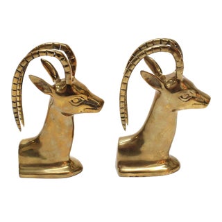 Mid-Century Brass Ram Head Bookends For Sale