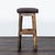 Rustic style reclaimed barnyard wood stools with leather seats. Brand: Timeless Journey. Dimensions (in): 15W x 12D x 28H.
