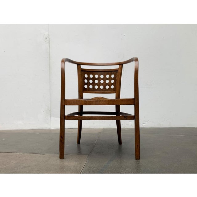 Elegant bugholz armrest chair by jacob & josef kohn after a design by otto wagner from the turn of the century. A design...