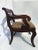 This antique English armchair is of the William IV period (1830-1837) The back strecher has neoclassical carving on the...