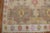 One of a kind corridor size Turkish Kars rug from the 20th century. A tan geometric field with multiple large scale tribal...