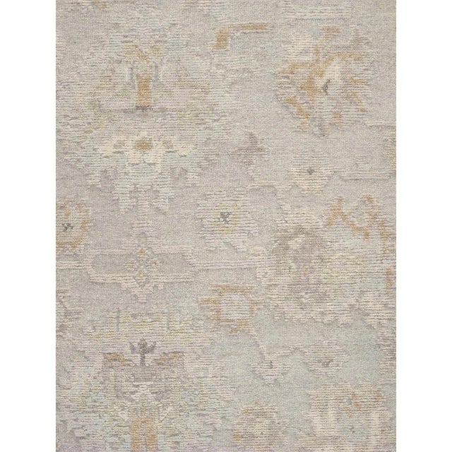 Meet Pasargad Home Oushak hand-knotted Rug, upholding a timeless, elegant style of design that has been the centerpiece of...