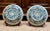 A striking pair of oversized blue and white Chinese porcelain charger plates featuring traditional dragon and phoenix...