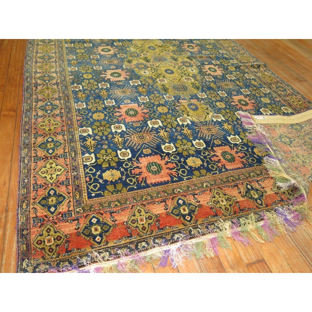 Spectacular collector-level finely woven early 20th century Persian Senneh rug. The weaver added a multicolored fringe...