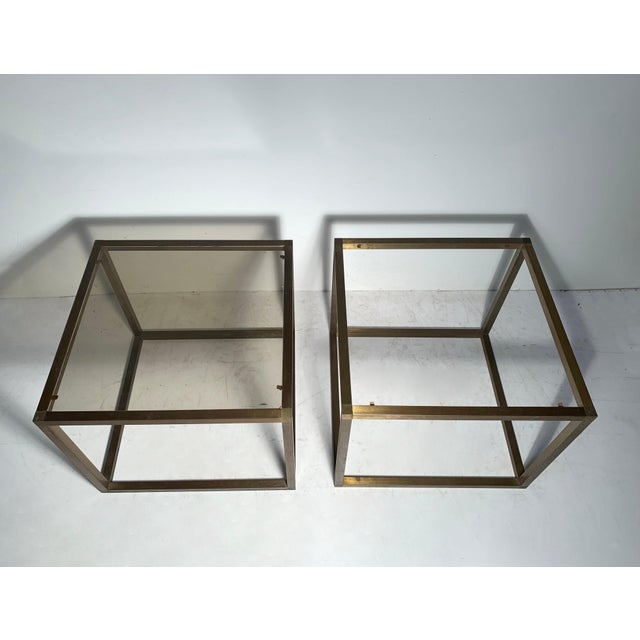 1960s-1970s bronzed extrusion tables with tinted glass. In the manner of Milo Baughman. Possibly Italian. 1 piece of glass...