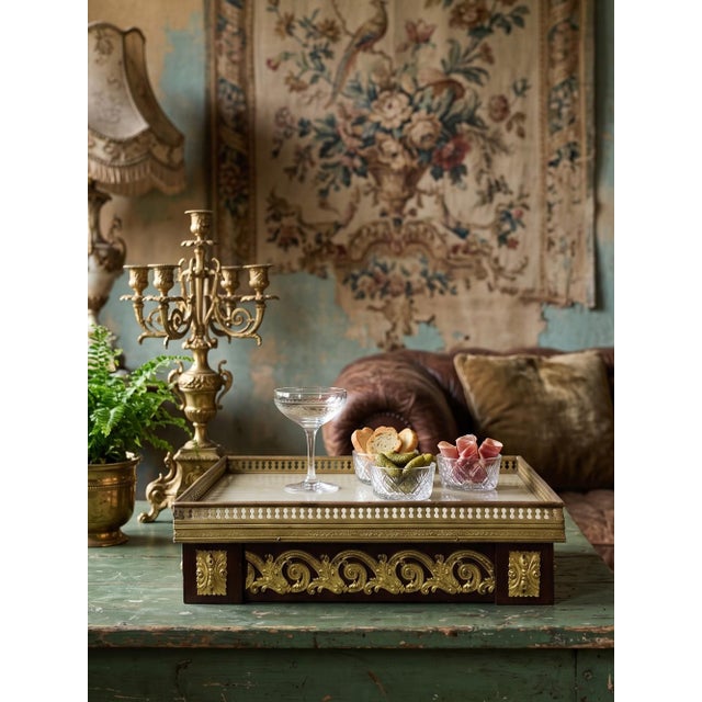 A very beautiful antique side table or pedestal tabletop, made of veneered wood, gilt metal, and a white onyx plaque....