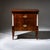 Early Biedermeier chest of drawers with two drawers and flanking marble pilasters. The chest rests on tapered square legs...