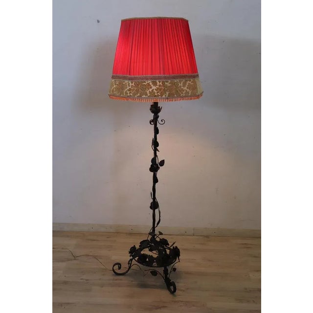 Beautiful early 20th century Art Nouveau iron floor lamp. The body of this lamp is a true work of art in iron....