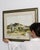 This 1930s painting from France is a painting, housed in a wood and glass frame. Its form follows honest, well-...