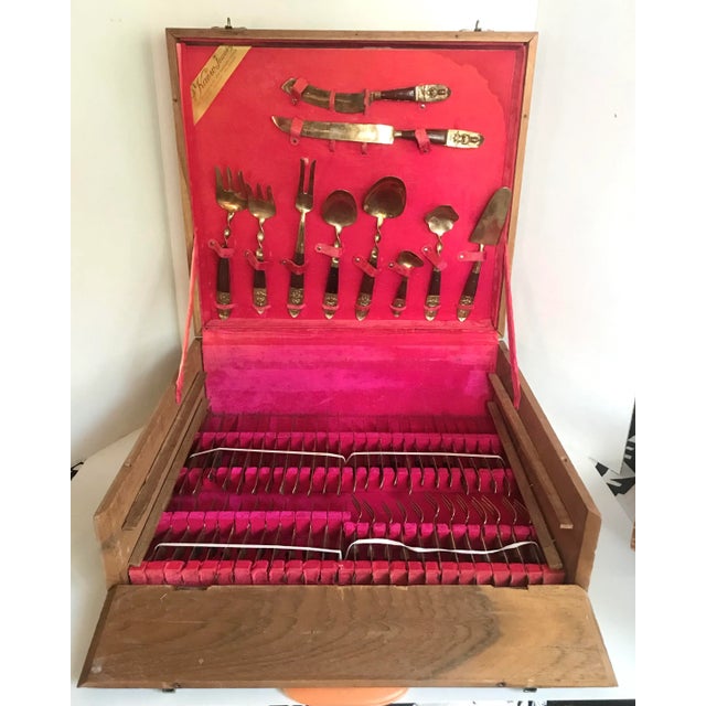 Here is a gorgeous set of brass and rosewood flatware and serving pieces. Each piece has a beautiful portrait of the...