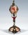 Artfully decorated silver clock by a Viennese master: Silver figure of a Roman foot soldier or squire in a short tunic...
