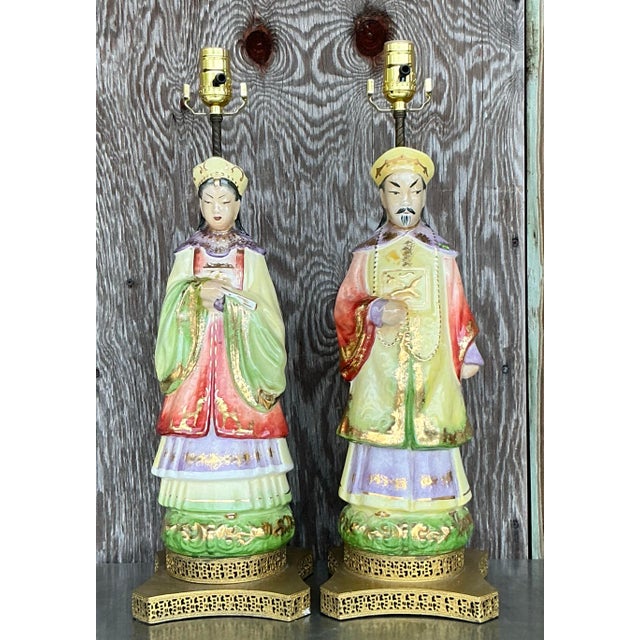 This stunning pair of vintage Asian glazed ceramic emperor lamps brings an air of regal elegance to your space. Featuring...