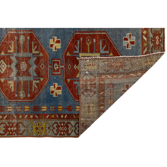 Elevate your hallway, entry, or transitional space with this exceptional antique Malayer wool runner rug. Woven by hand...