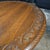 This English Round Oak Carved Edge Turned Leg Stretcher Base Coffee Table has a nice x stretcher base. It is a good side...