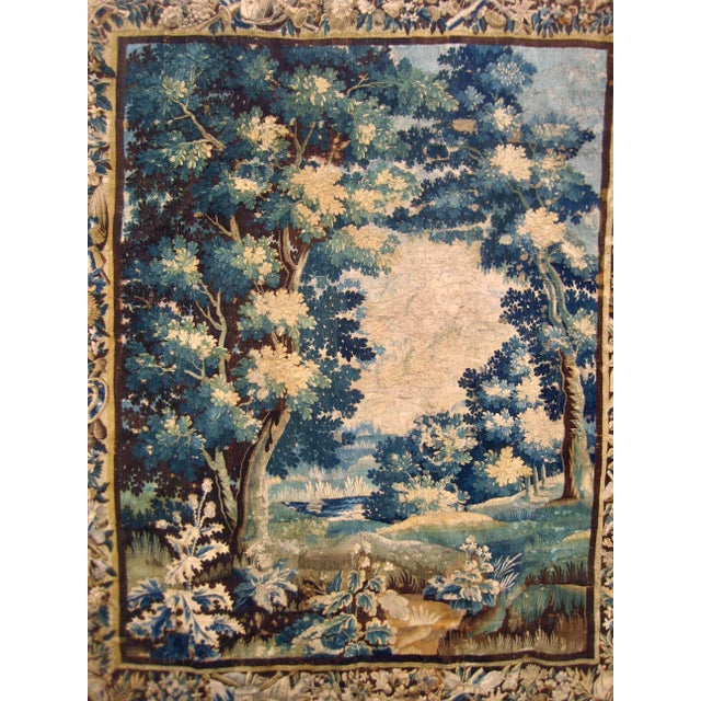 This Aubusson Verdure from the early 17 hundred is different by the fact that it is a Verdure but one with no animals or...