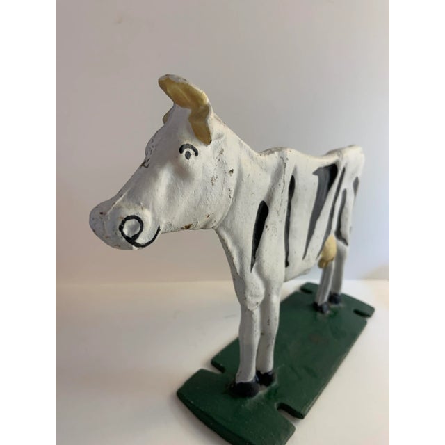 Country farm Holstein Cow cast iron doorstop. Vintage in age. Heavy. Painted metal.