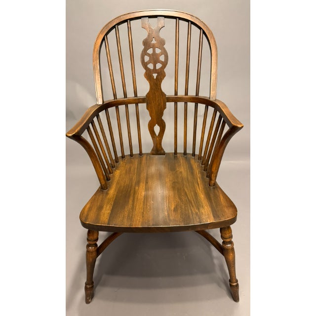 A classic American Windsor style splat back armchair, crafted in the later part of the 20th century, circa 1985....