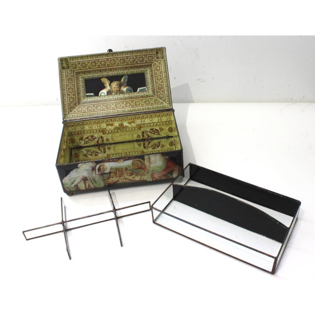 This stylish and chic decoupaged jewelry box was created by Willian F of New York City, and the piece is fabricated with...