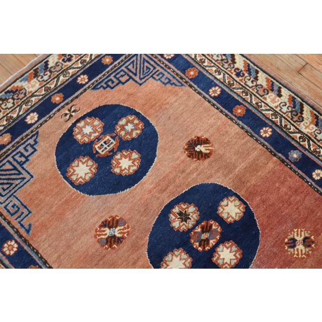 Very rare matching pair of antique khotans with one measuring 4'1'' x 5'11'' and the other measuring 4'4'' x 6'2''.