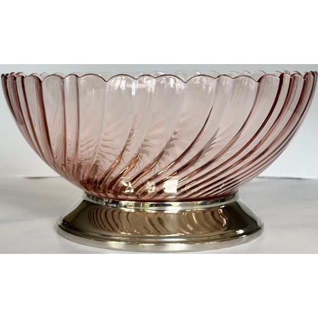 In a peachy-pink swirl motif, here is a centerpiece or salad bowl, like no other for the spring table! Made in France....