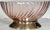 In a peachy-pink swirl motif, here is a centerpiece or salad bowl, like no other for the spring table! Made in France....