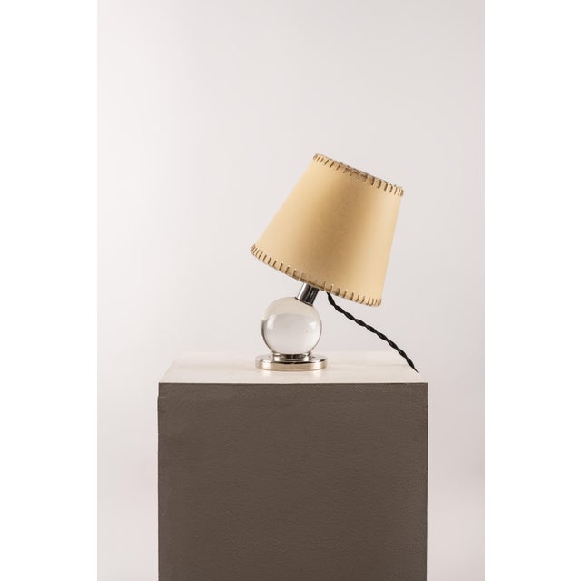 An elegant French Art Deco table lamp, attributed to Jacques Adnet and made around the 1930s. The piece stands out for its...