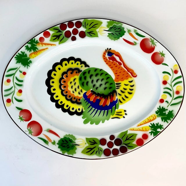 We love this Turkey Platter. It’s a large oval metal that’s colorfully painted in enamel making it great as a display...