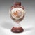 This is an antique decorative flower vase. A Continental, painted milk glass baluster urn, dating to the late Victorian...