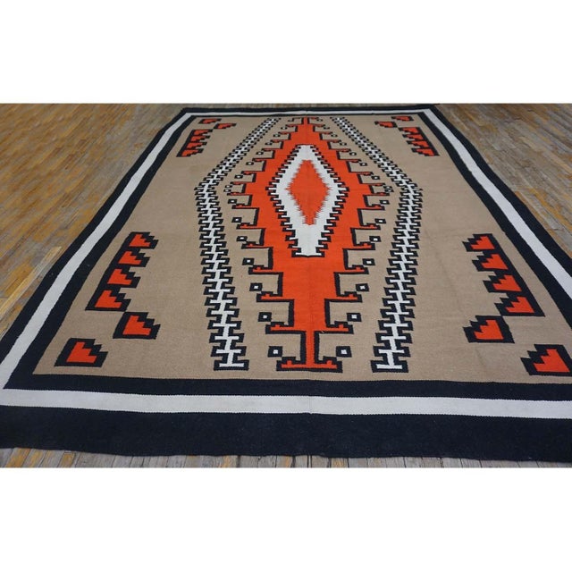 Antique Navajo Room Size Wool Brown Rug, Circa Date: 1940s. This exceptional example of mid-century Southwestern weaving...