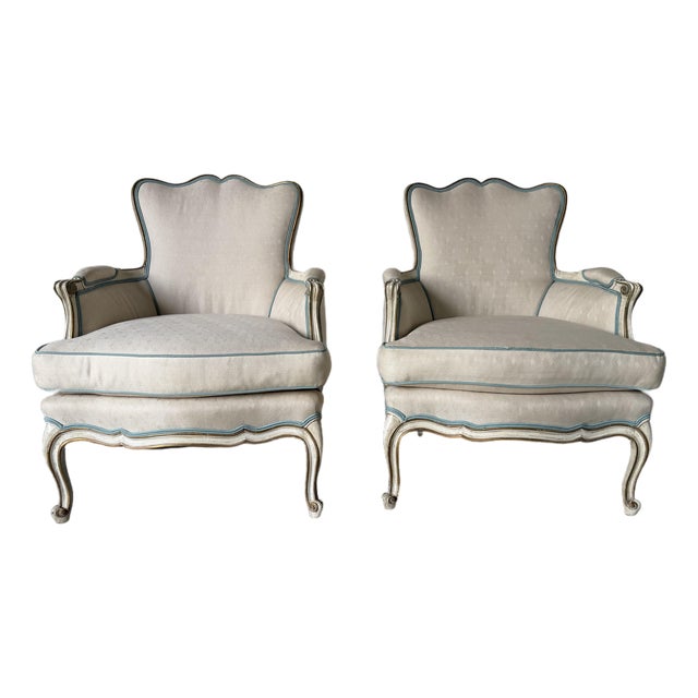 Pair of Vintage Hollywood Regency French Louis XV-Style Painted & Gilt Bergère Lounge Armchairs For Sale