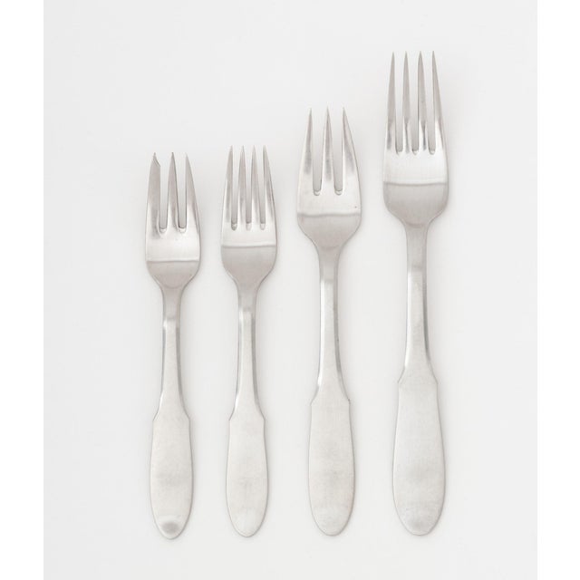 Georg Jensen "Mitra" Stainless Steel Flatware Partial Service, each marked "Georg Jensen Stainless / Made in Denmark"...