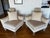 Gorgeous pair of Hollywood Regency style corner chairs in a warm, remarkably soft cream velvet. Tapered Lucite legs and...