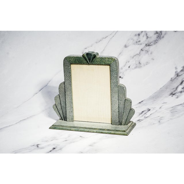 An exceptionally rare and visually striking example of Art Deco design, this antique shagreen picture frame embodies the...
