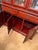 This elegant hutch has a rich reddish brown finish. This two-piece Hutch features a rear mirror, a top section with three...