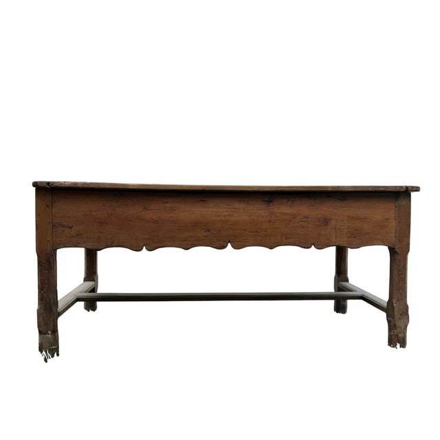 Large baker’s dough chest artfully crafted featuring a lovely scalloped detail and a worn storage compartment concealed...