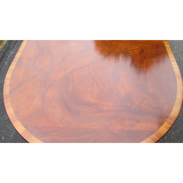 This is a super nice mahogany dining table made by Joseph Gerte of Boston MA. Gerte is known as a superior cabinet maker...