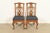 An outstanding pair of Chippendale or Georgian style side chairs or dining chairs By Henredon USA, Circa 1980s Carved...