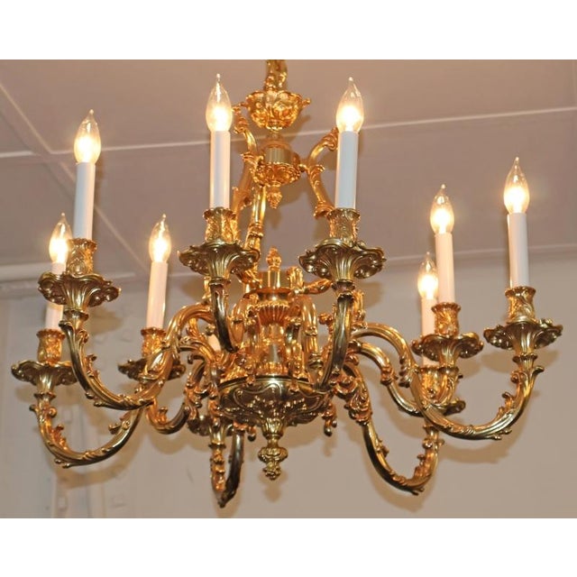 Italian Gilt Bronze Rococo Style 10 Light Chandelier Dimensions :25" Tall X 29" Wide X 29" Deep Make a dramatic statement...
