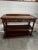 A striking antiquye French oak server or huntboard featuring exceptional hand-carved detail and a dramatic black & white...