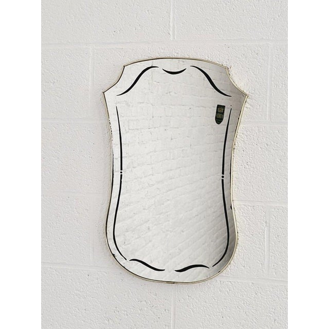 Free-form, screen-printed rearview mirror from the 1960s on a gold frame This piece has an attribution mark, I am sure...