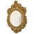 Richly decorated Baroque antique mid-century gold mirror with a heavy gold plaster frame from the 1950s. A beautiful,...