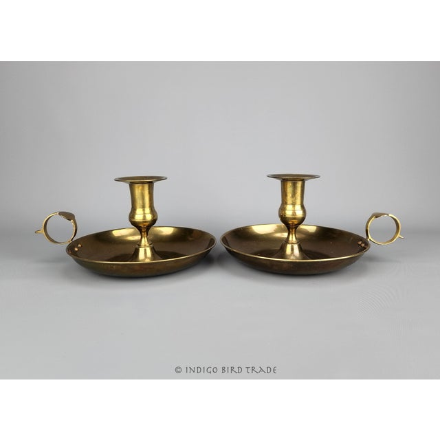Pair of Oversized Candleholders with Handle and Drip Tray These candleholders are made from solid brass and features...