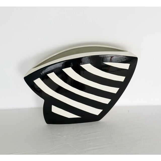 We are very pleased to offer a stunning, ceramic vase by designer John Bergen, circa the 1990s. This ceramic vase embodies...