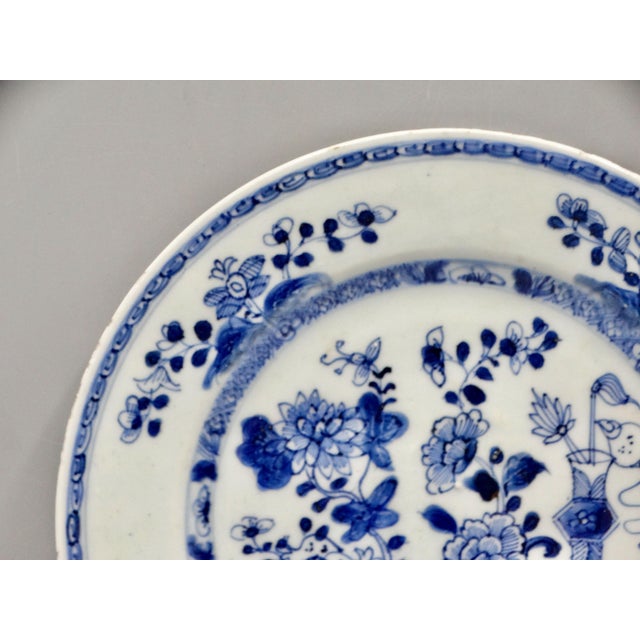 Late 19th-Century Dutch Delft plate with a hand painted chinoiserie design. It is a lovely example of early Chinese...