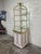 I think this was a display piece in an old Victoria Secret store, but not sure. Its really cool! Glass shelves, twisted...