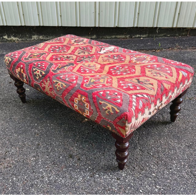 George Smith Standard Ottoman in kilim on turned mahogany legs.