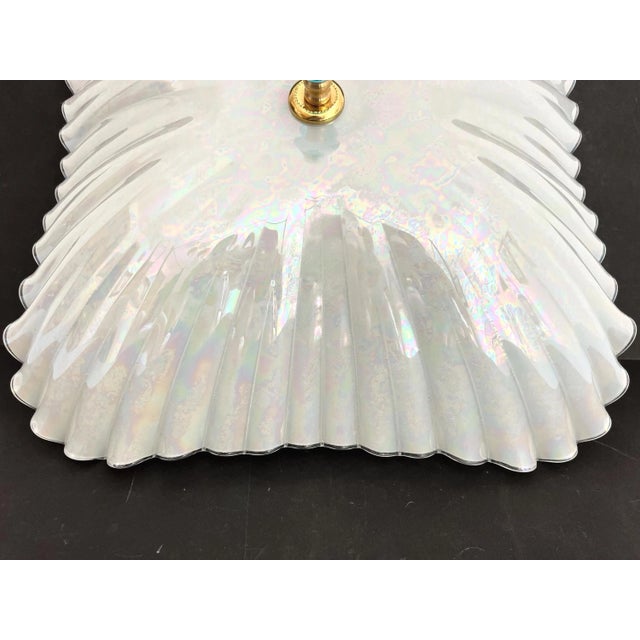 Stunning mid century opalescent glass flush mount light in a chic rounded square shell shape with raised fluted scrolls...