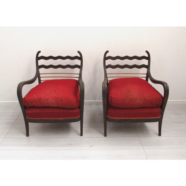 Wonderful pair of Paolo Buffa armchairs from the 1940s, Italian manufacture skilfully crafted in solid beech wood, the...