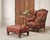 A handsome wingback lounge chair and matching ottoman made by Old Hickory Tannery in Hickory, North Carolina, for the King...