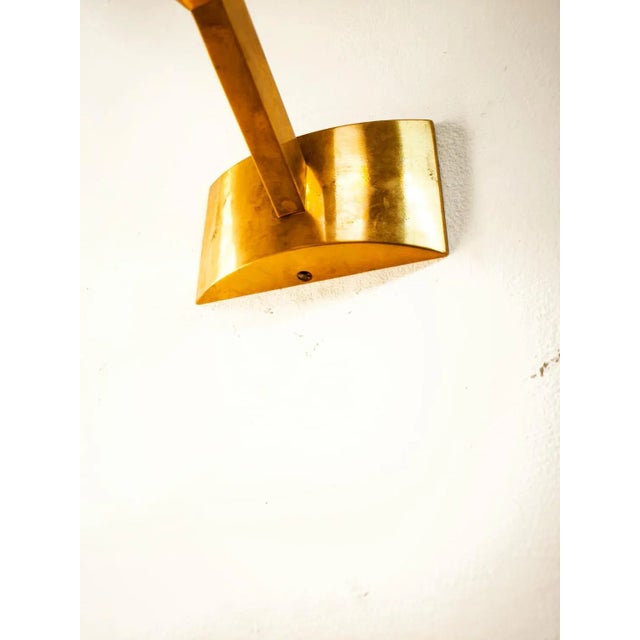 Brass Wall Light with Oval Glass, in Very Good conditions. Designed 1970 to 1979 Up to 250V (Europe/UK Standard).The...